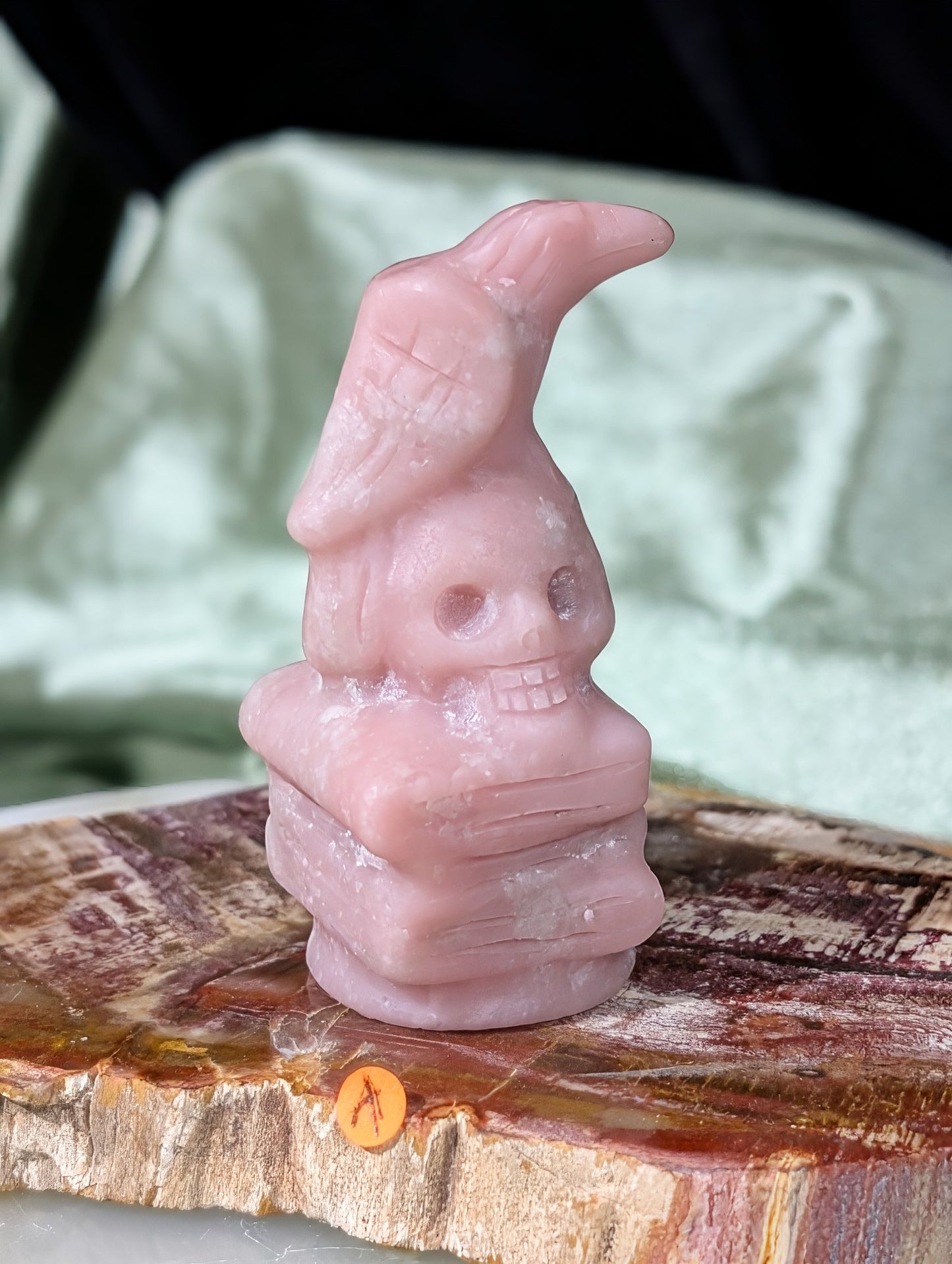 Pink Opal Raven on Skull on Books Figurine