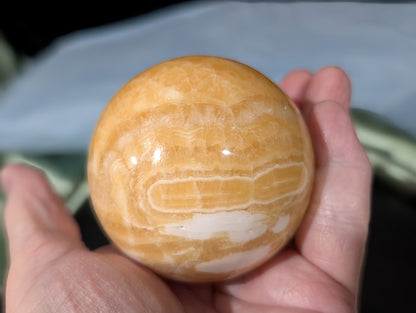 Banded Orange Calcite Sphere 2K