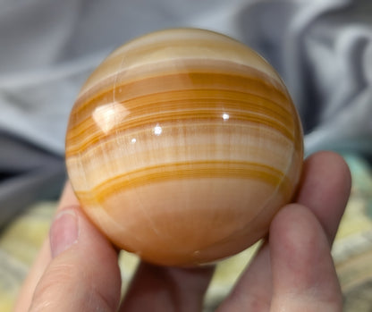 Banded Peach Calcite Sphere
