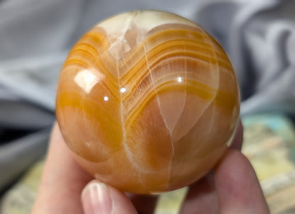 Banded Peach Calcite Sphere