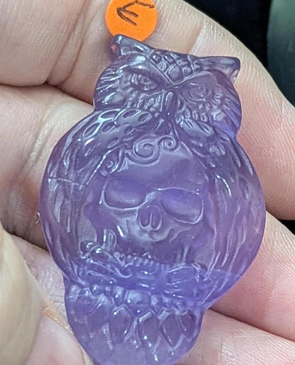 Fluorite Owl Holding Skull Carving