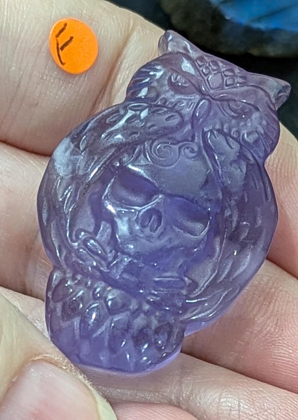 Fluorite Owl Holding Skull Carving