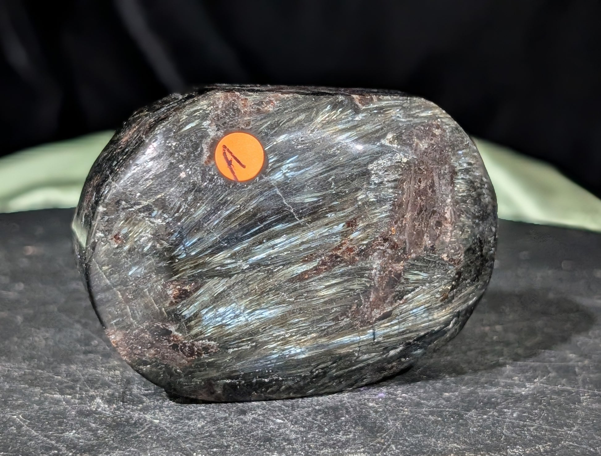 Garnet and Astrophyllite Palm Stone 1A3