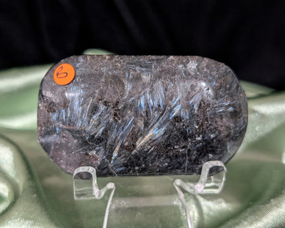 Garnet and Astrophyllite Palm Stone 1B1