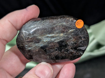 Garnet and Astrophyllite Palm Stone 1E2