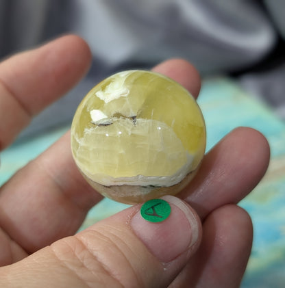 Hand Carved Yellow Brucite Sphere