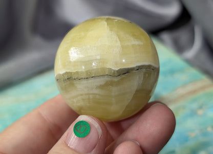 Hand Carved Yellow Brucite Sphere