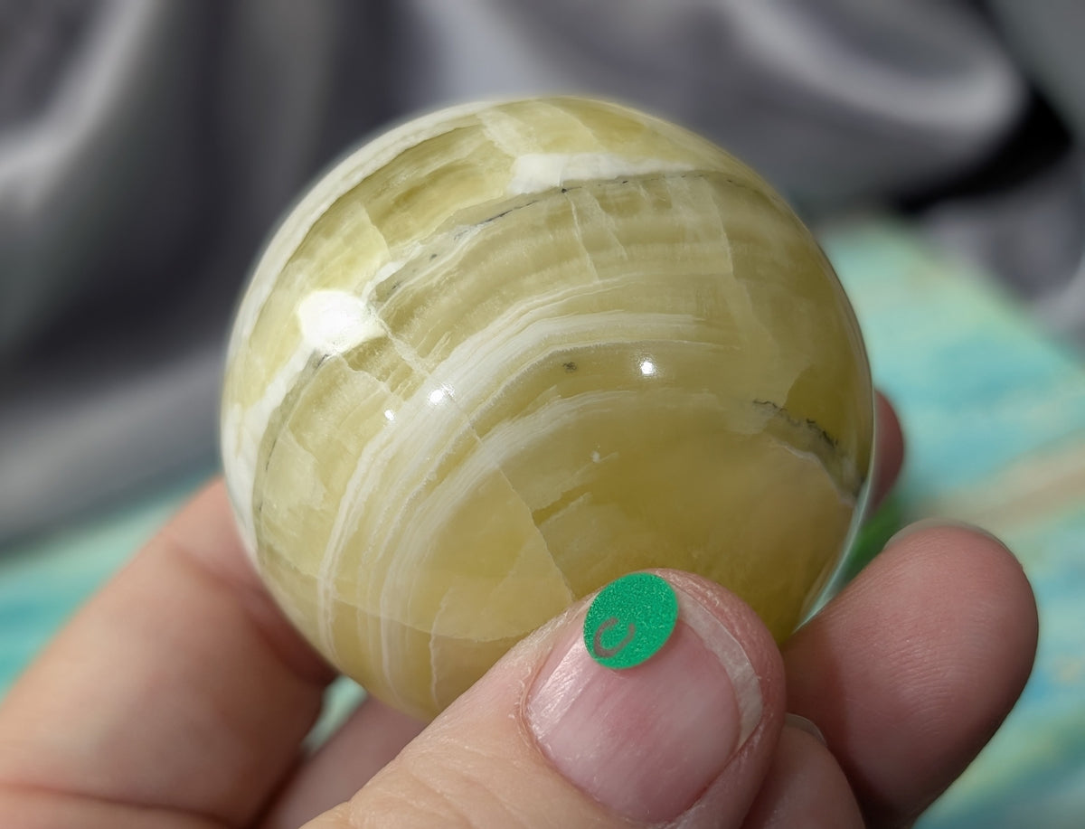 Hand Carved Yellow Brucite Sphere