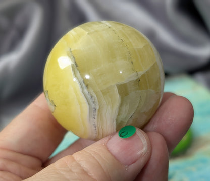 Hand Carved Yellow Brucite Sphere