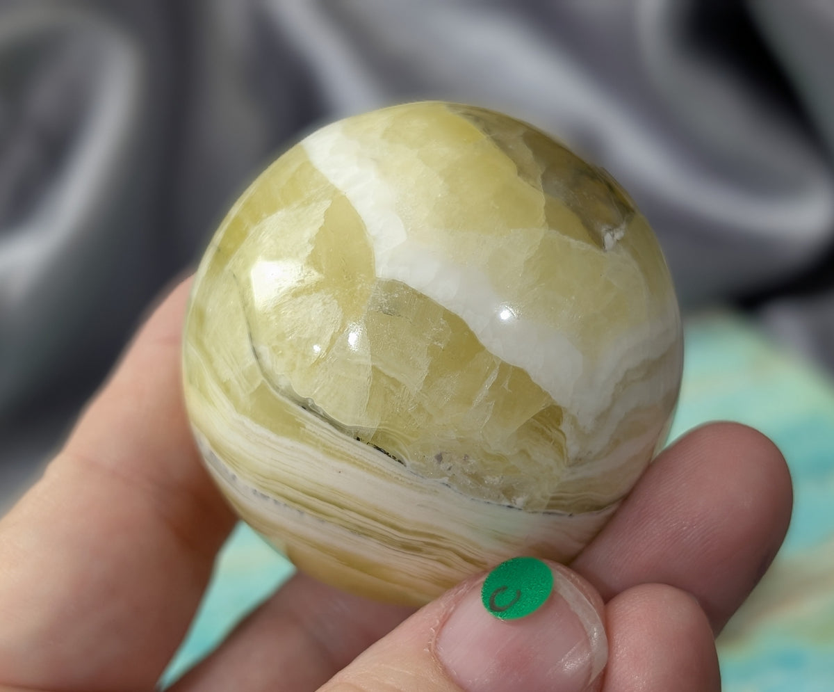 Hand Carved Yellow Brucite Sphere