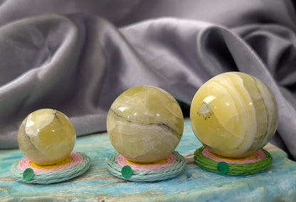 Hand Carved Yellow Brucite Spheres