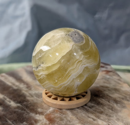 Rare Hand Carved Yellow Brucite Sphere