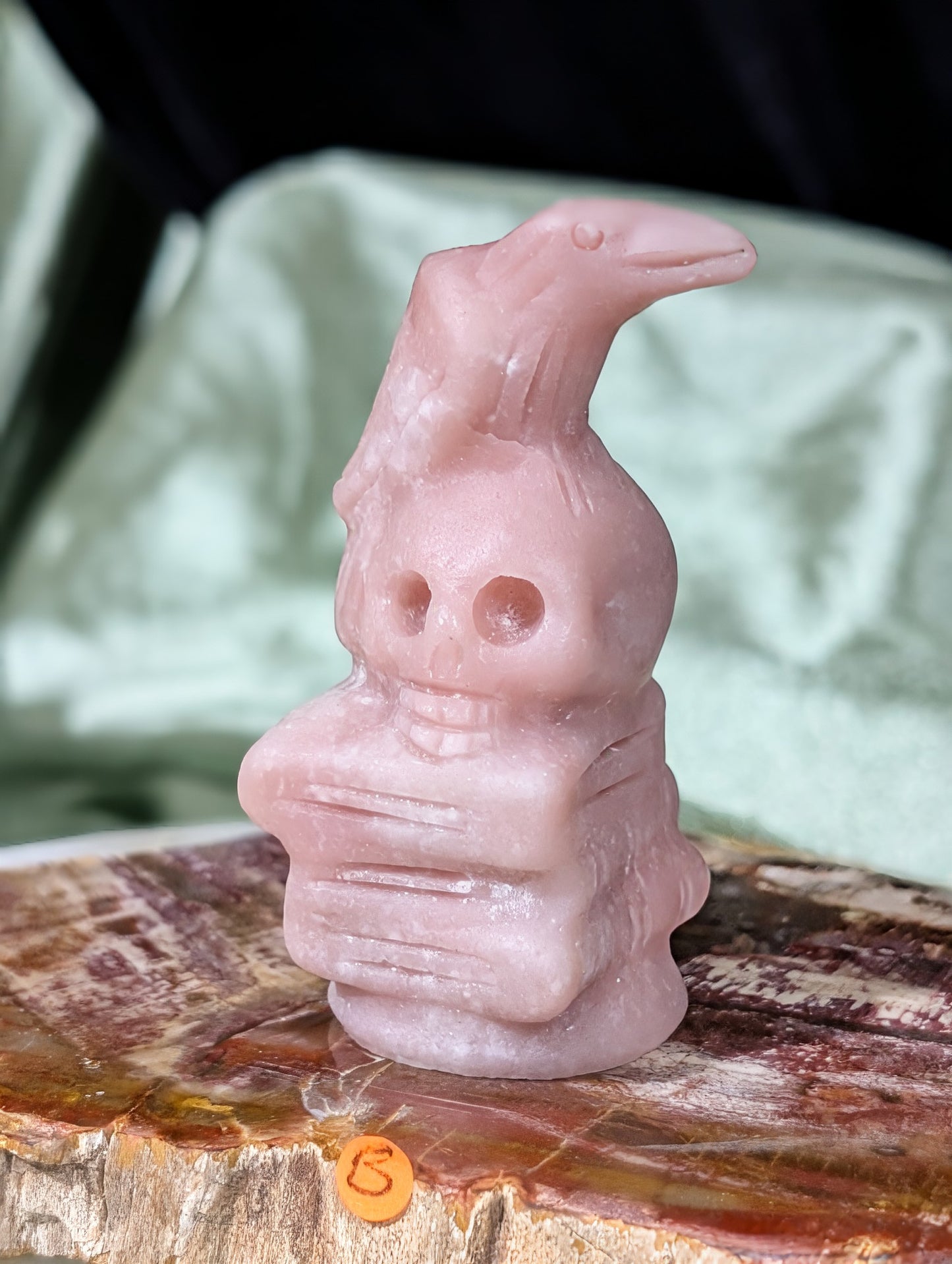 Pink Opal Raven on Skull on Books Figurine