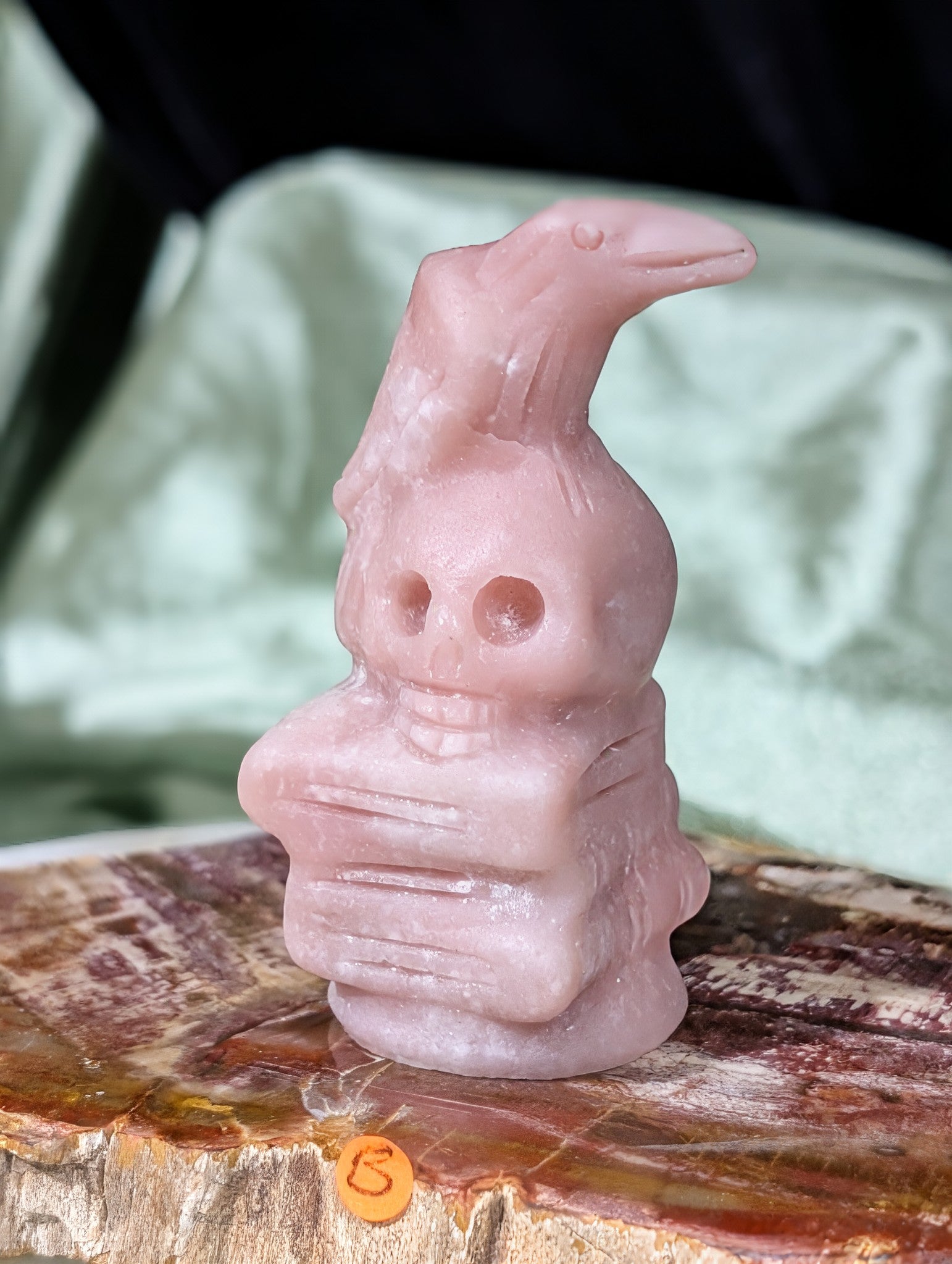 Pink Opal Raven on Skull on Books Figurine