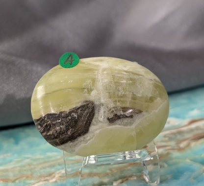 Yellow Brucite Palm Stone