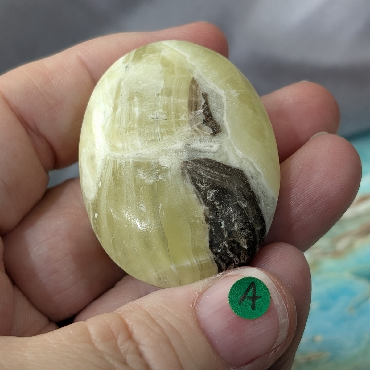 Yellow Brucite Palm Stone