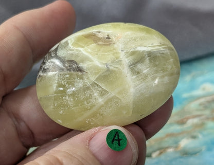 Yellow Brucite Palm Stone