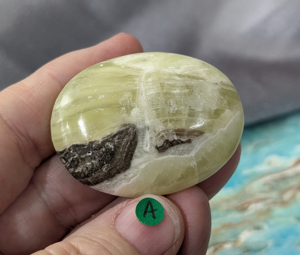 Yellow Brucite Palm Stone