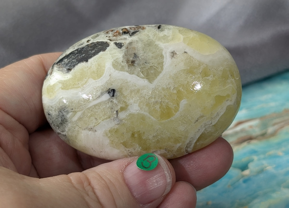 Yellow Brucite Palm Stone