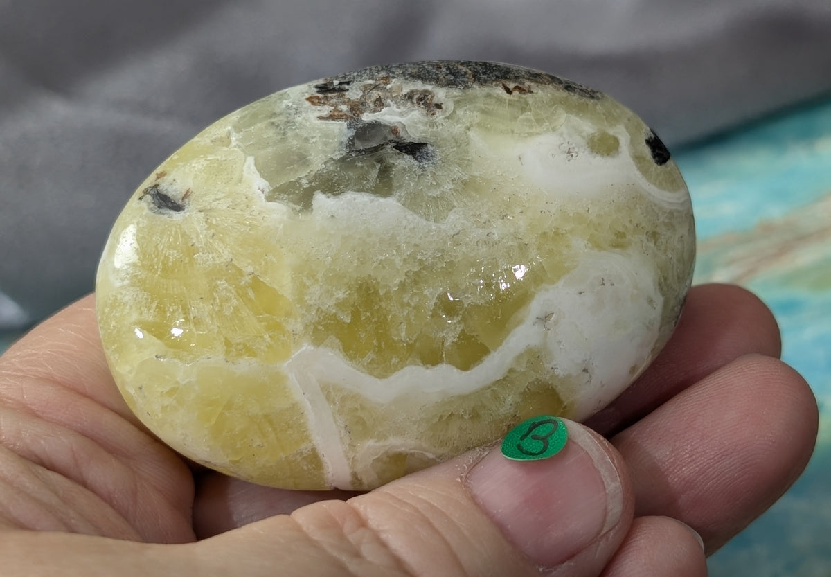 Yellow Brucite Palm Stone
