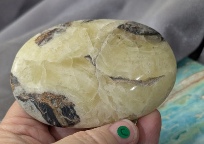 Yellow Brucite Palm Stone